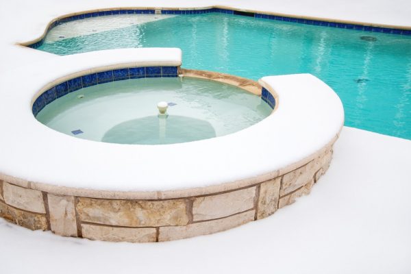 How to get snow off your pool cover